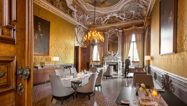 Aman Venice, Italy. Venice Babymoon. Yellow Dining Room